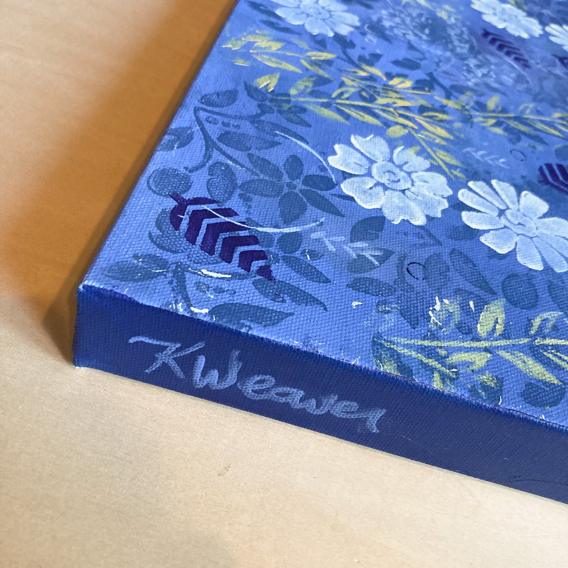 side image of original abstract acrylic painting periwinkle background white flowers yellow-green and navy leaves cool calm feeling