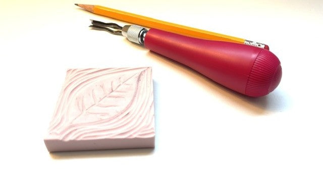 Carving tools and stamp made by artist Katie Weaver