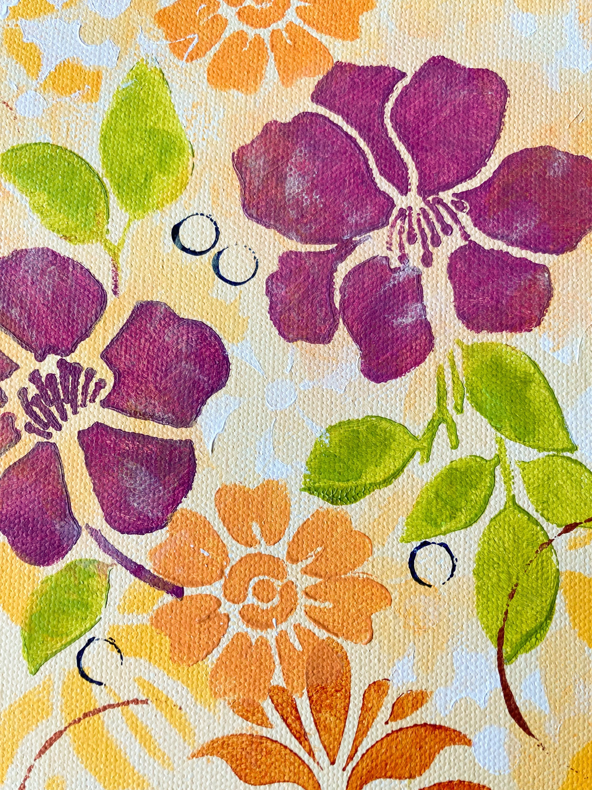 detail view floral Hawaiian theme acrylic painting on canvas dark pink flowers orange flowers green leaves circles and scrolling shapes warm and cheerful
