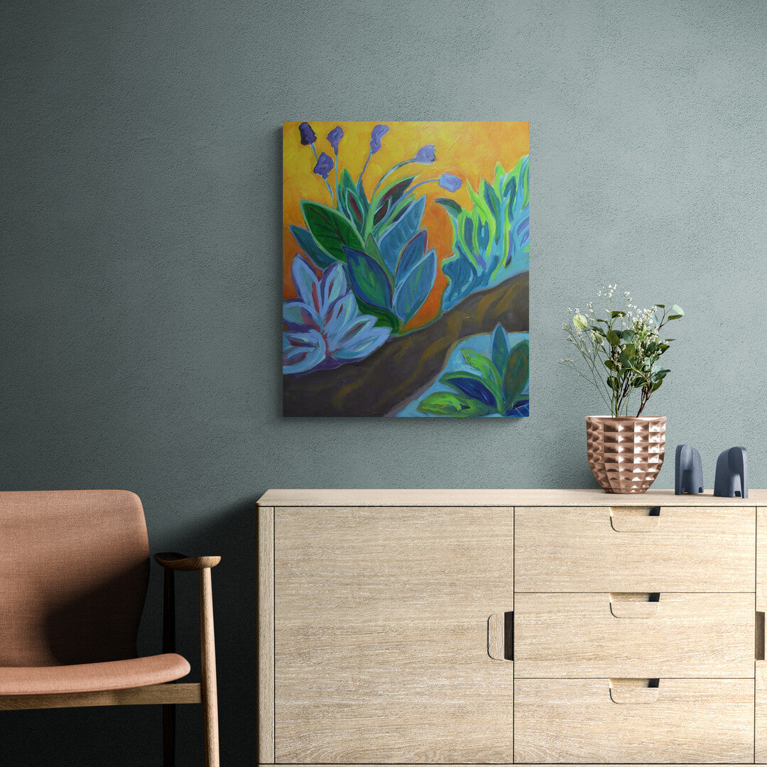 Bright abstract acrylic painting of purple tulips green and blue leaves and orange background displayed in room